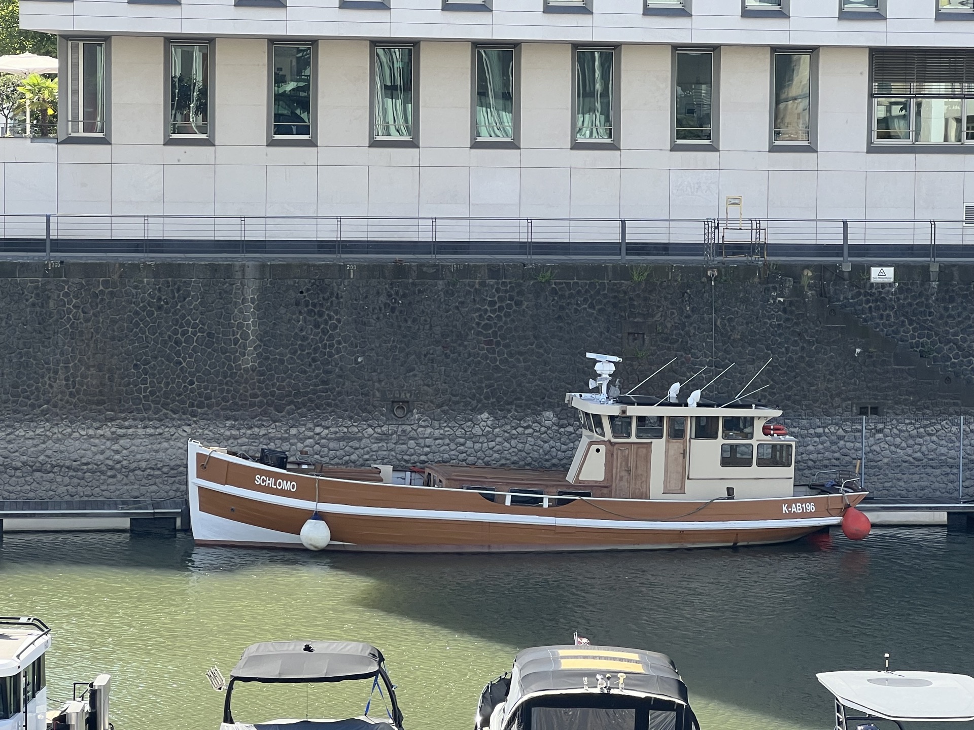 Schlomo moored at Rheinauhafen — city backdrop